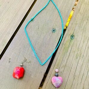 Teal blue seed bead necklace with two pendant
Pink heart and r…